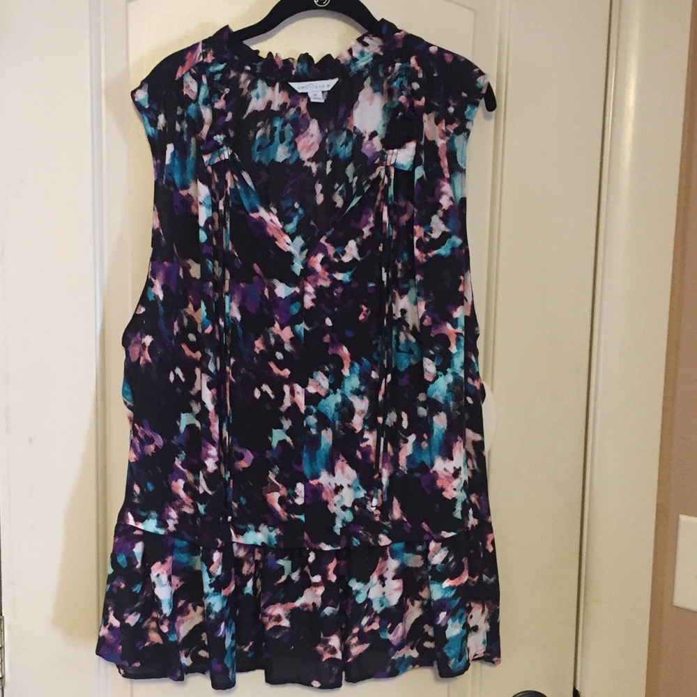 Boutique ruffled hem sheer sleeveless blouse